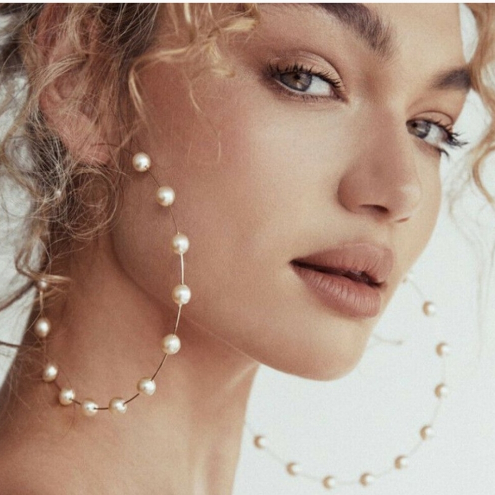 Woman's 925 silver with faux pearl earrings